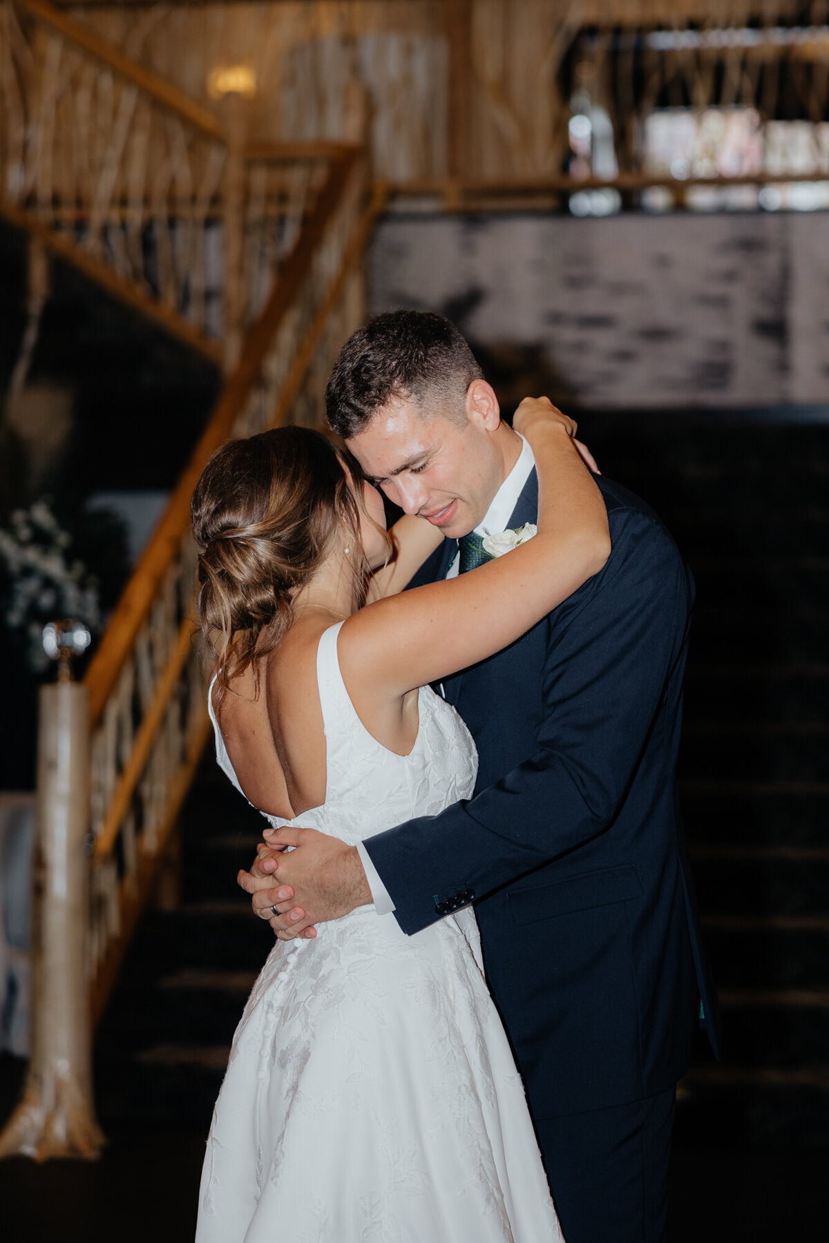 Couple's first dance during late-night reception