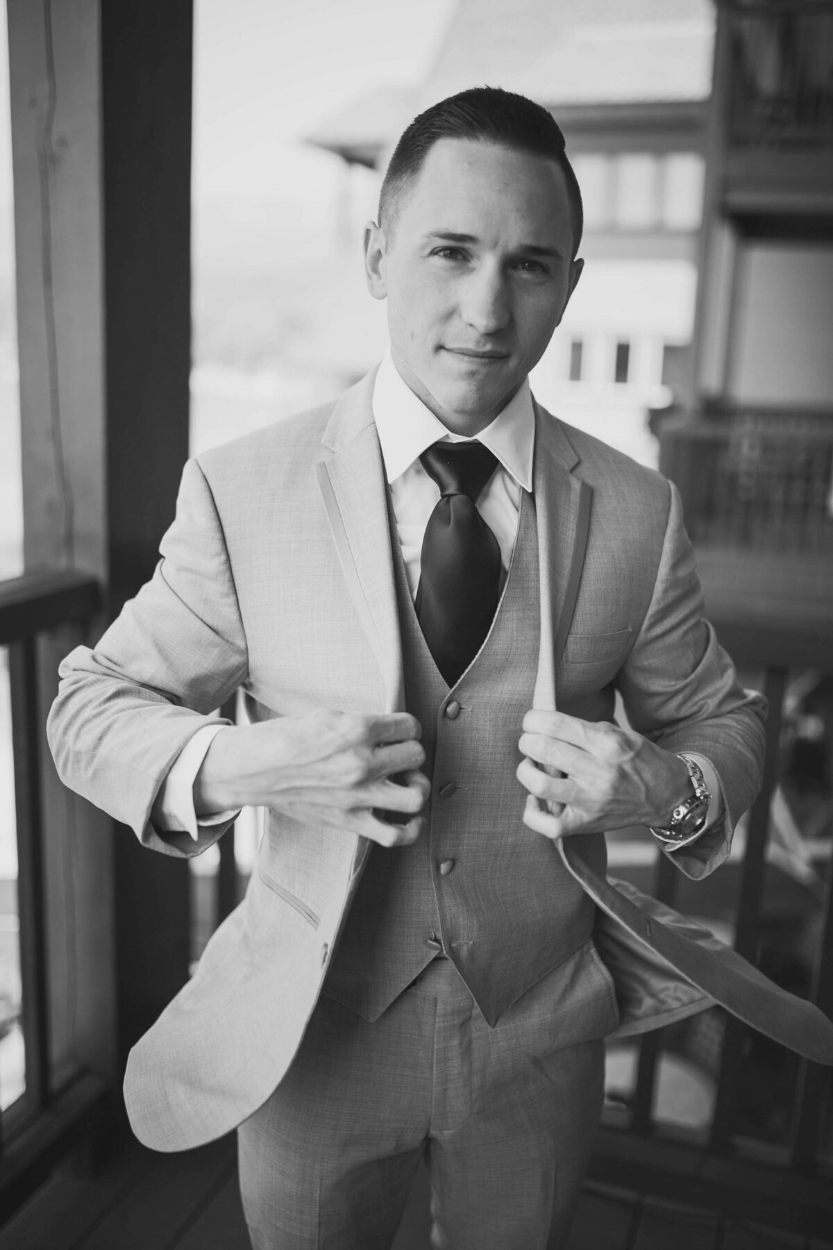 groom in suit jacket