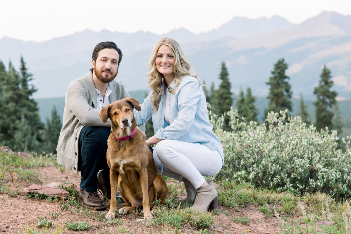 Engaged couple with their dog in the Colorado Rocky Mountains