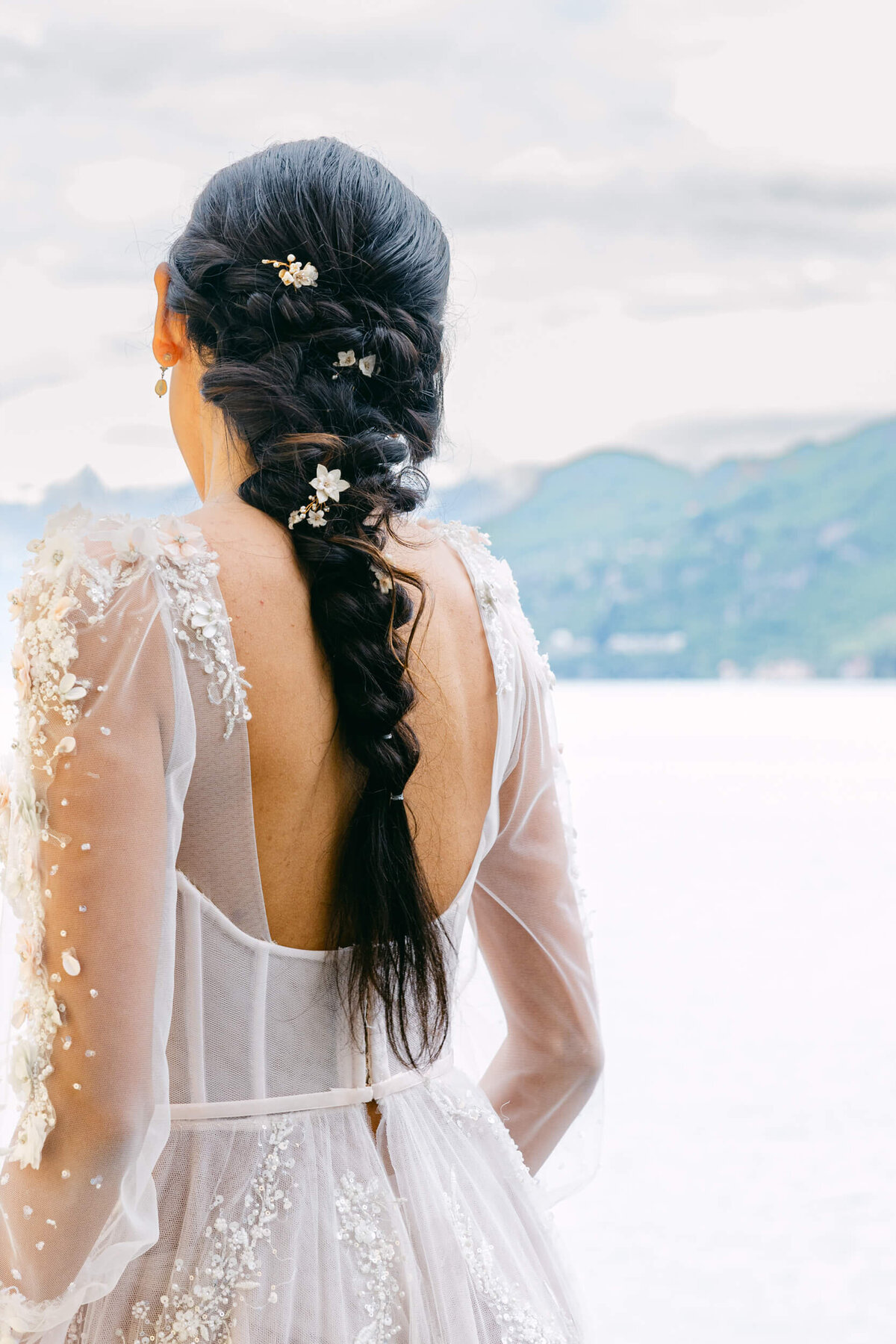 A wedding day bridal shot of a bride in her white dress at Villa Aura del Lago on lake como in Italy