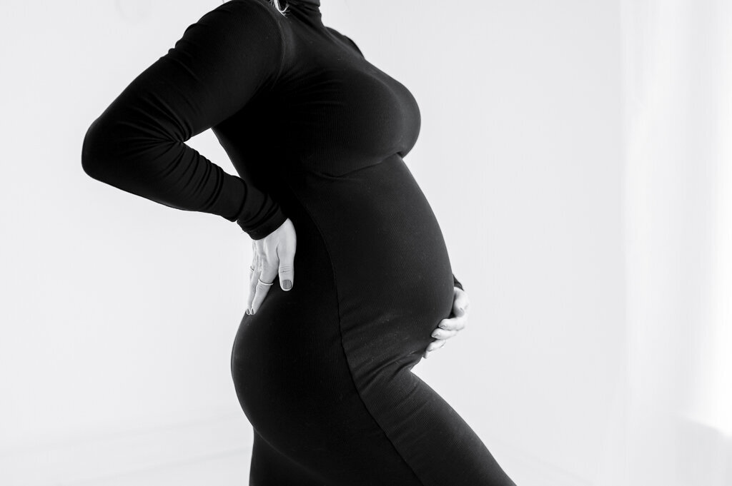 Pregnancy photo in black dress by Nashville maternity photographer Kristie Lloyd