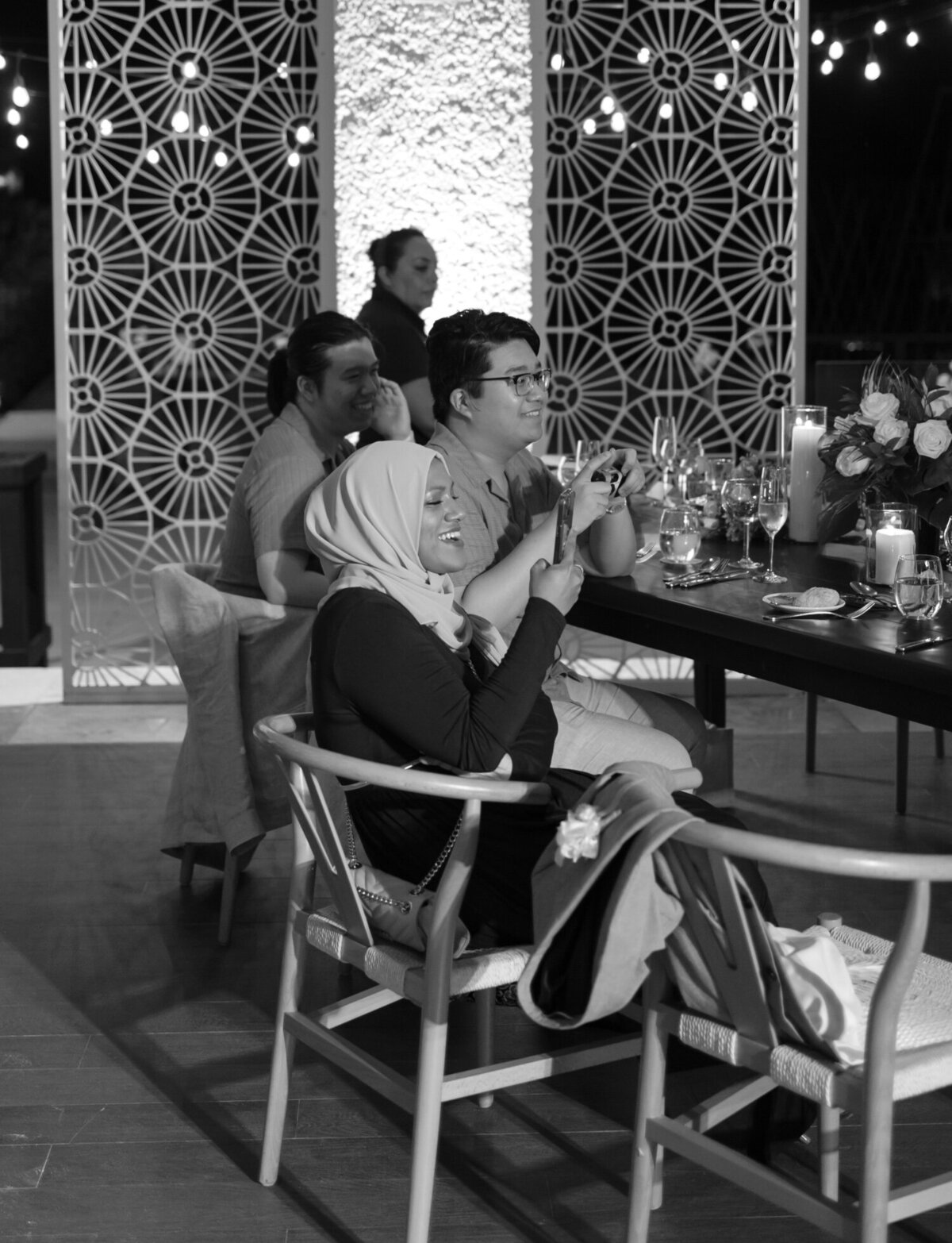 guests smile and clap, wedding reception at Paradisus Playa del Carmen, Mexico