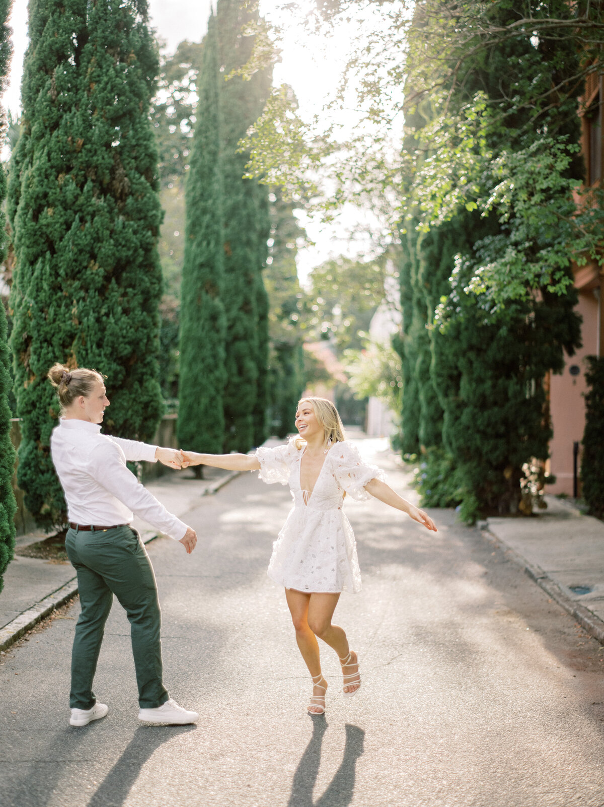 Dancing engagement photos in Charleston. Photography by Philip Casey.