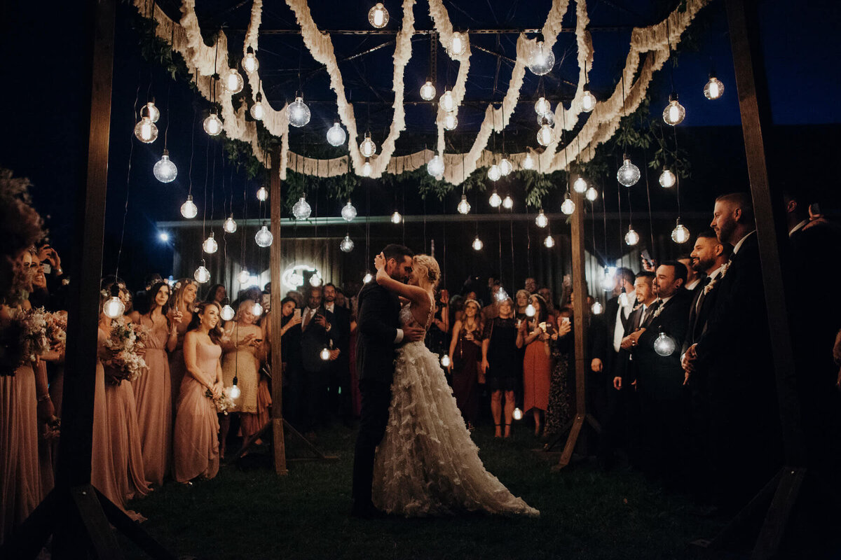 First dance under the stars and edison bulb string lights