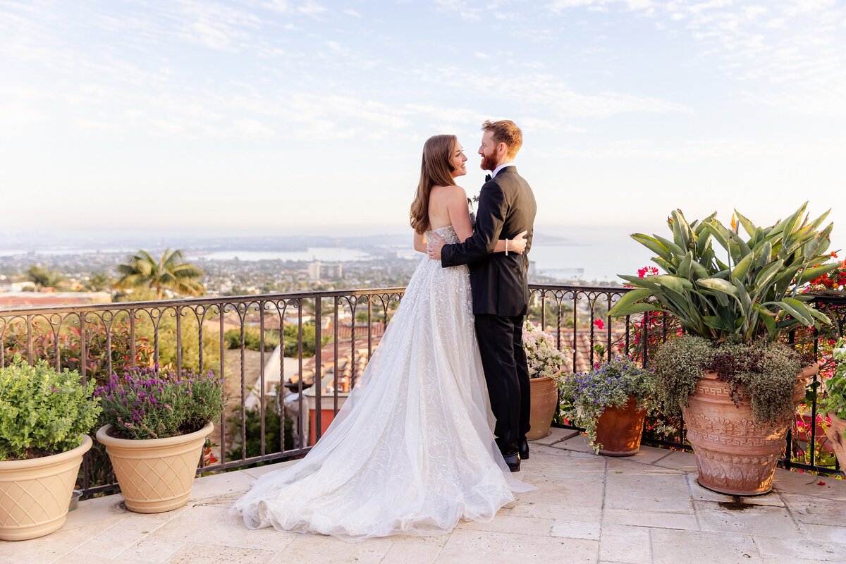 luxury wedding portrait of bride and groom overlooking San Diego bay