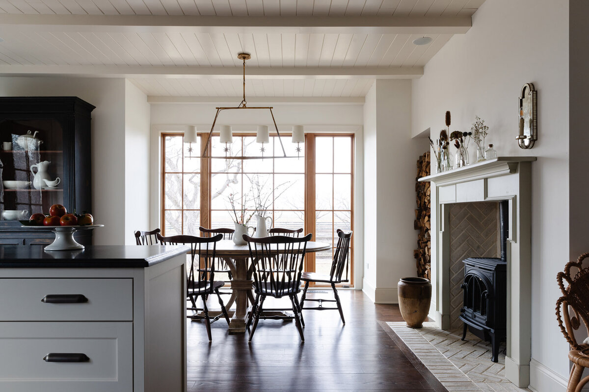 Dining room at the Derby house with wood fireplace