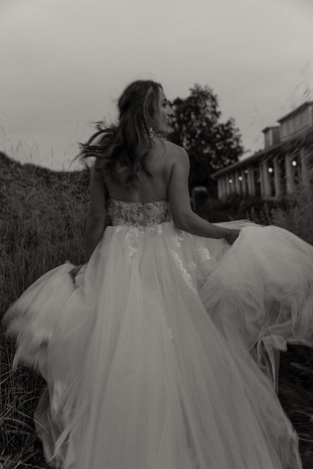 Bride Running Away Photo in Black and White  
