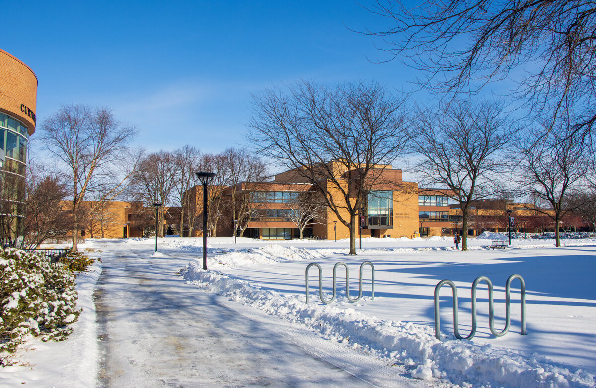 012721 Walking towards center of campus full of snow with bright blue sky