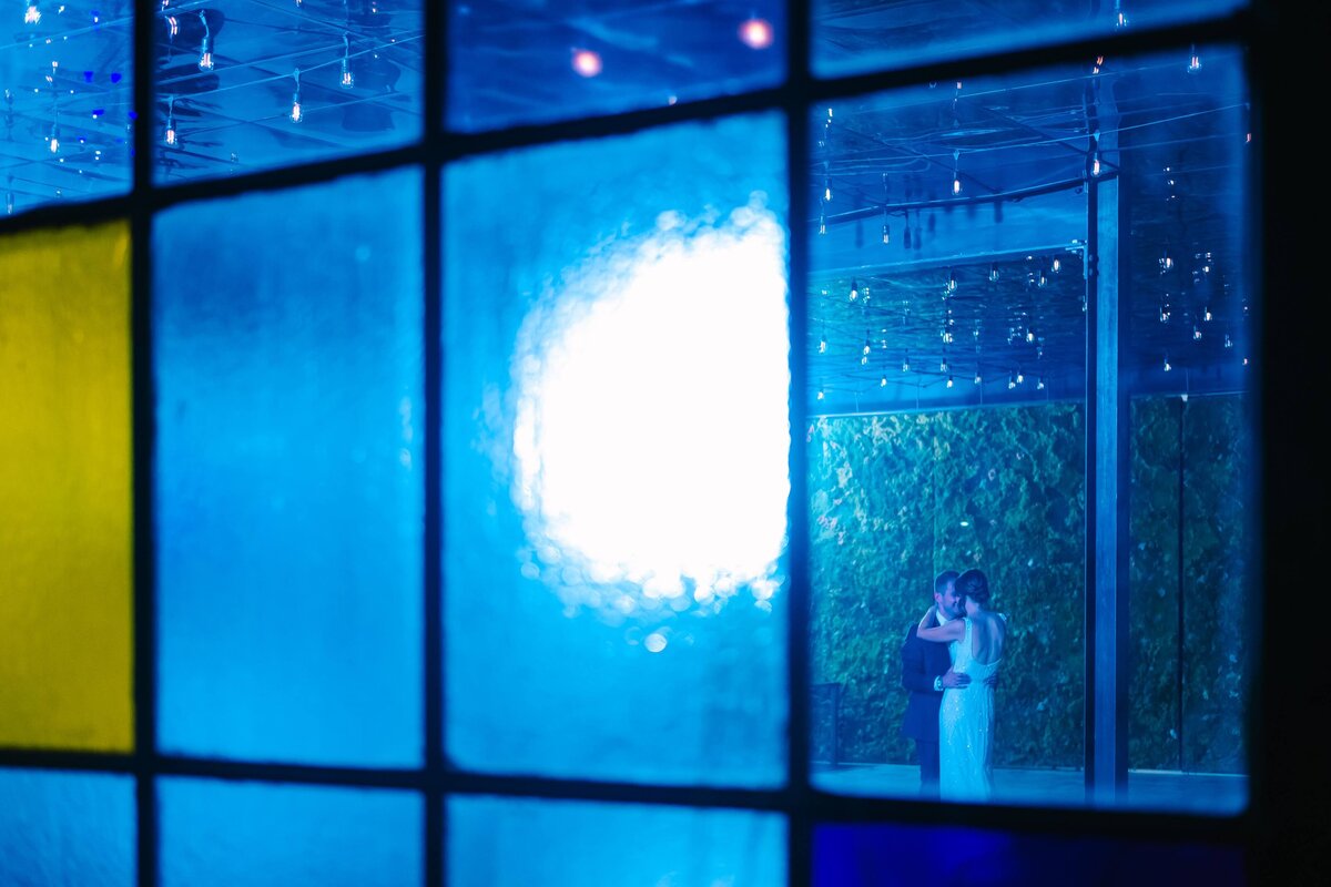 Bride and groom share a secret last dance at their wedding reception at Moss Denver.