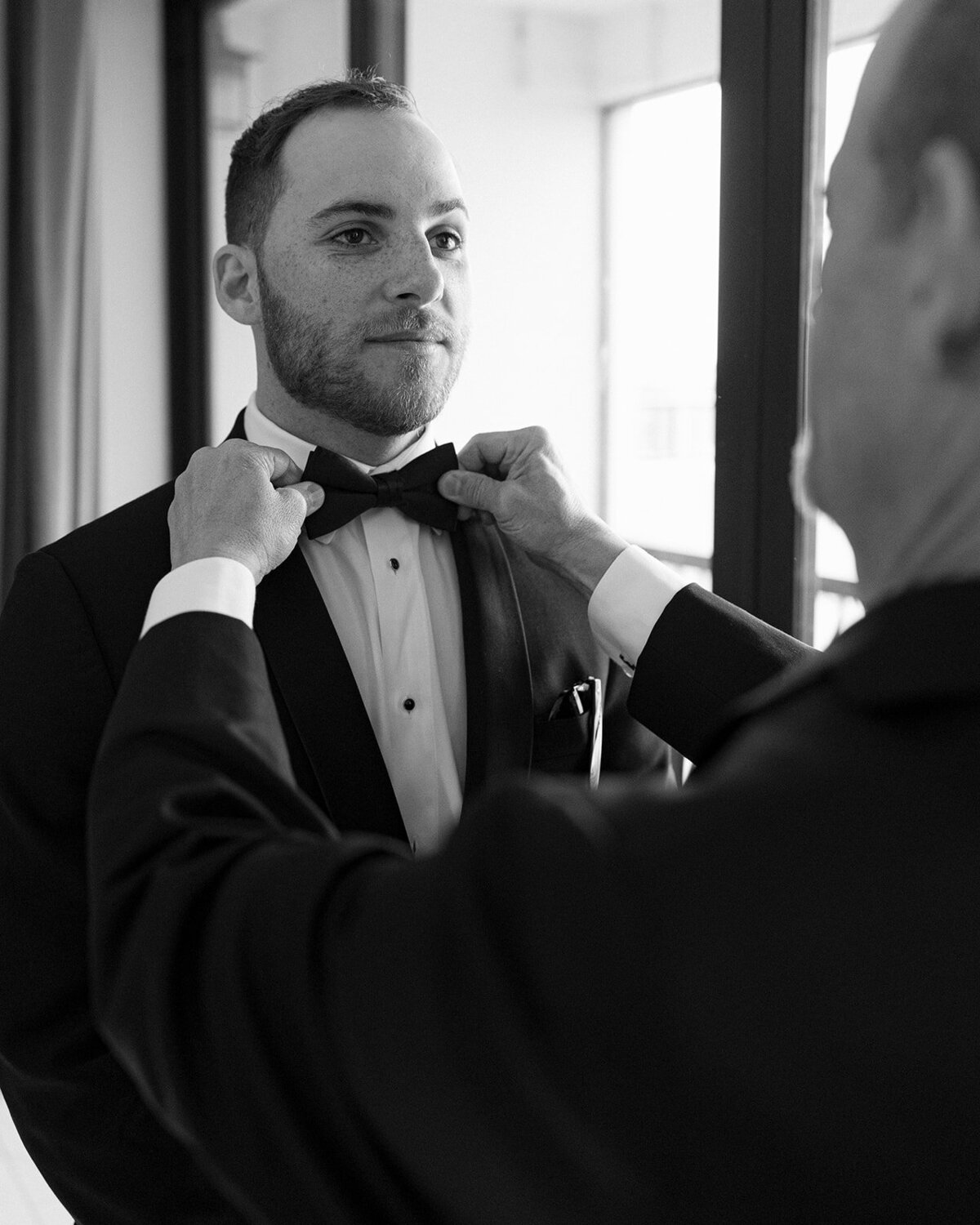 groom getting ready at bella collina weddings & events​