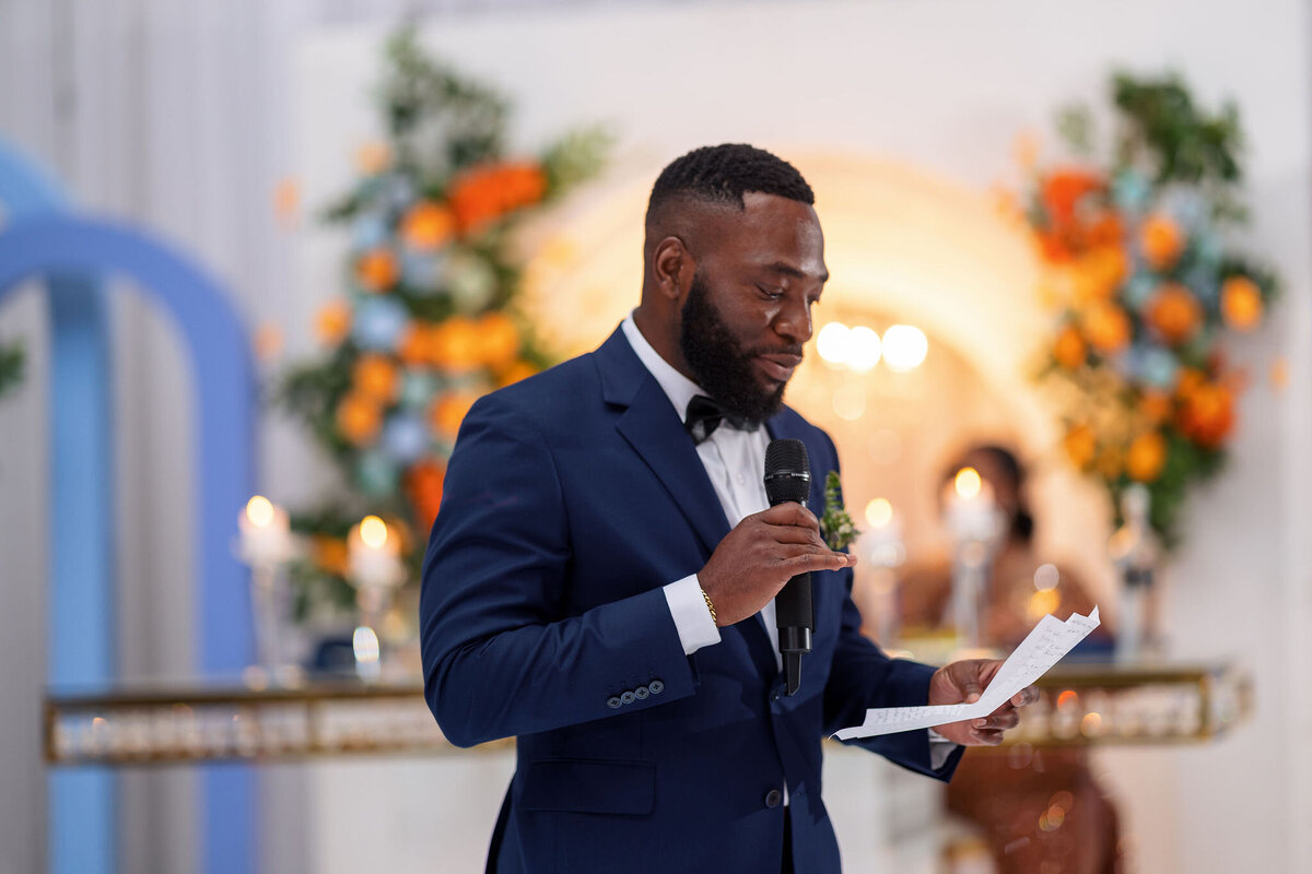 Tomi and Tolu Oruka Events Ziggy on the Lens photographer Wedding event planners Toronto planner African Nigerian Eyitayo Dada Dara Ayoola ottawa convention and event centre pocket flowers Navy blue groom suit ball gown black bride classy  326