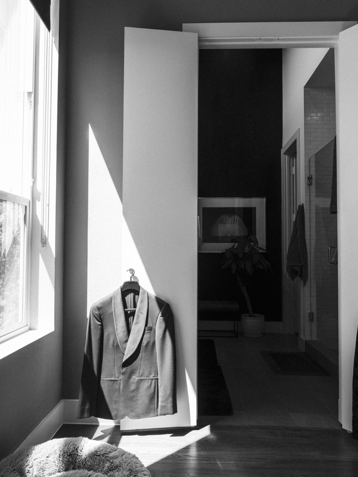 groom-suit-hanging-in-sunlight