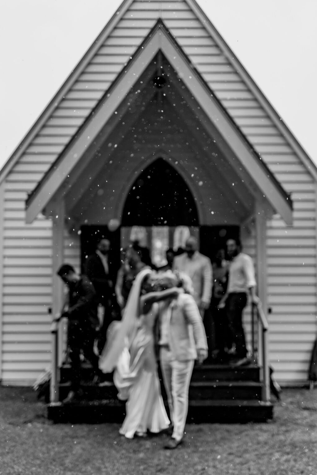 Jana and Jamie during a candid wedding ceremony moment in Auckland, photographed by Zanthe Vorsatz.