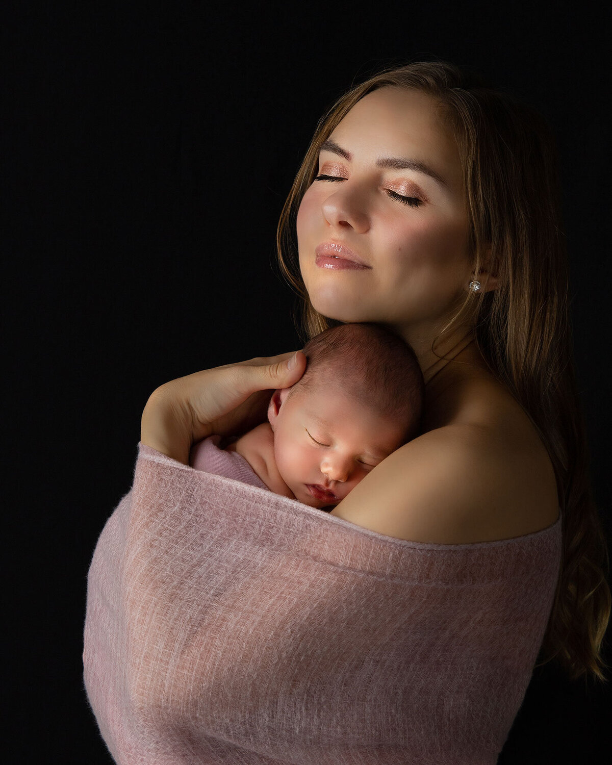 Tally Safdie newborn photography baby and mom wrapped hugging