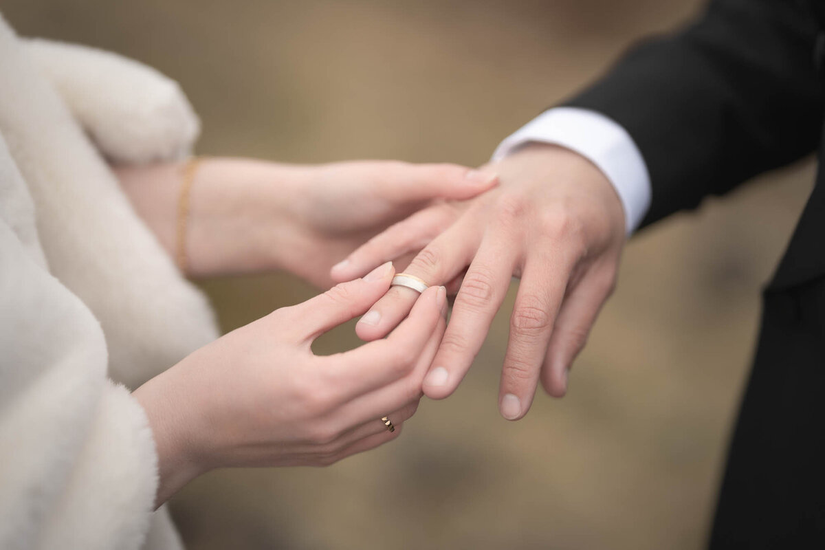 ring-exchange-wedding-hands-closeup
