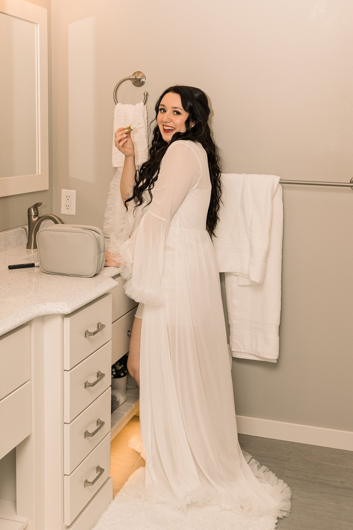 wedding photo of a bride getting ready in Central MN