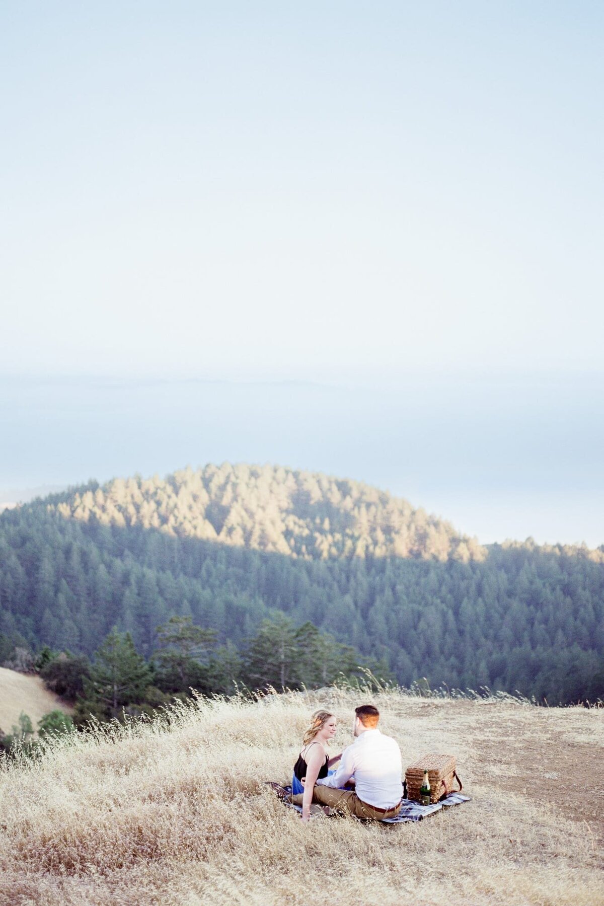 Couple picnic and engagement at Mount Tamalpais, captured by Mountain Top Engagement Photographer Robin Jolin.
