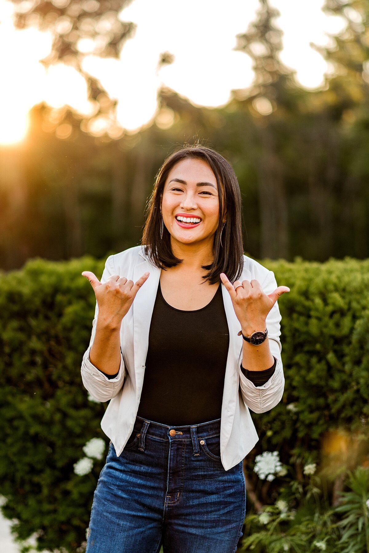 woman showing hang loose sign