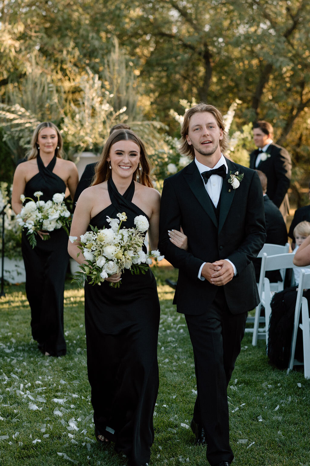 Bridesmaid and groomsman | Bella Fleur