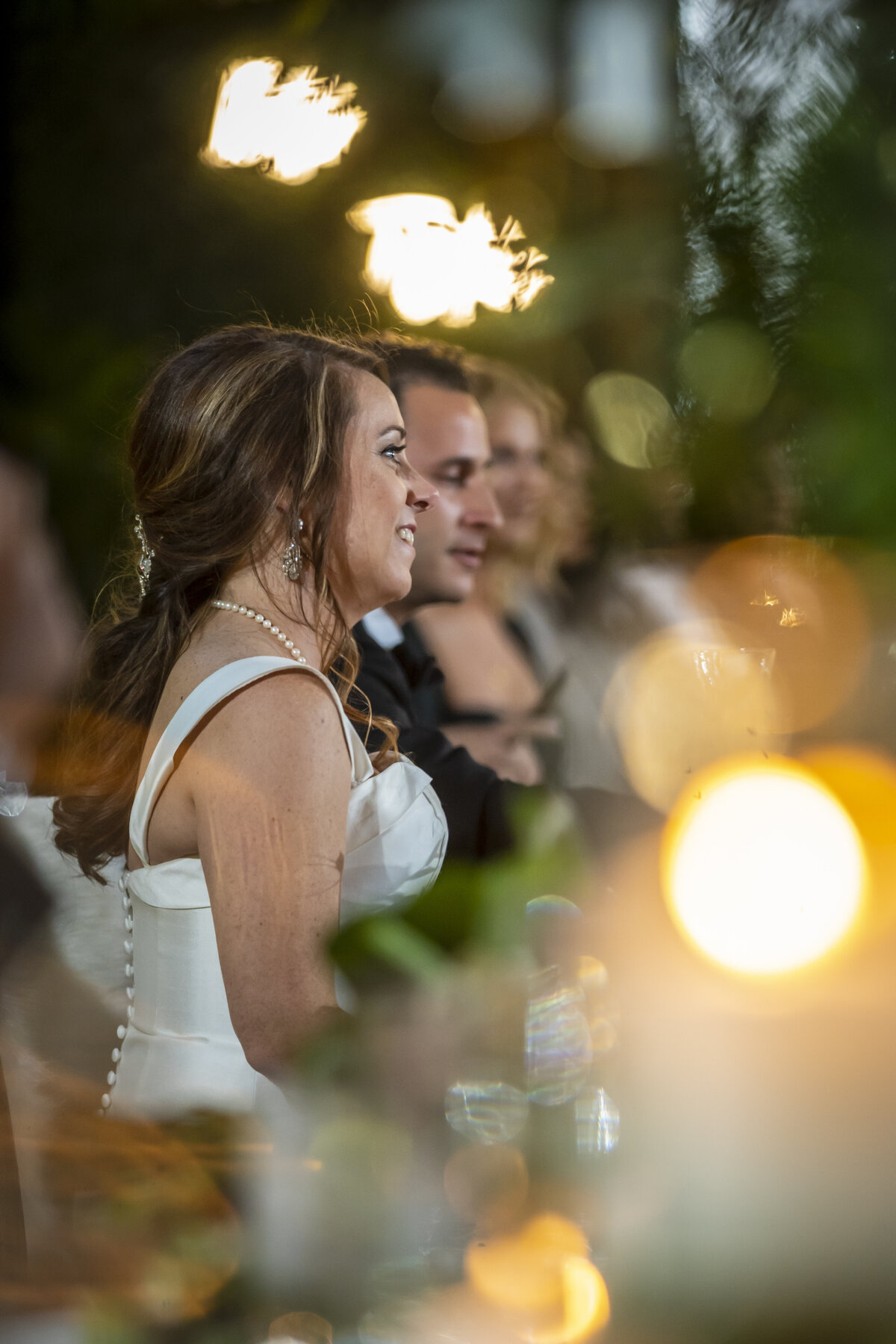 Bride and groom looking forward.