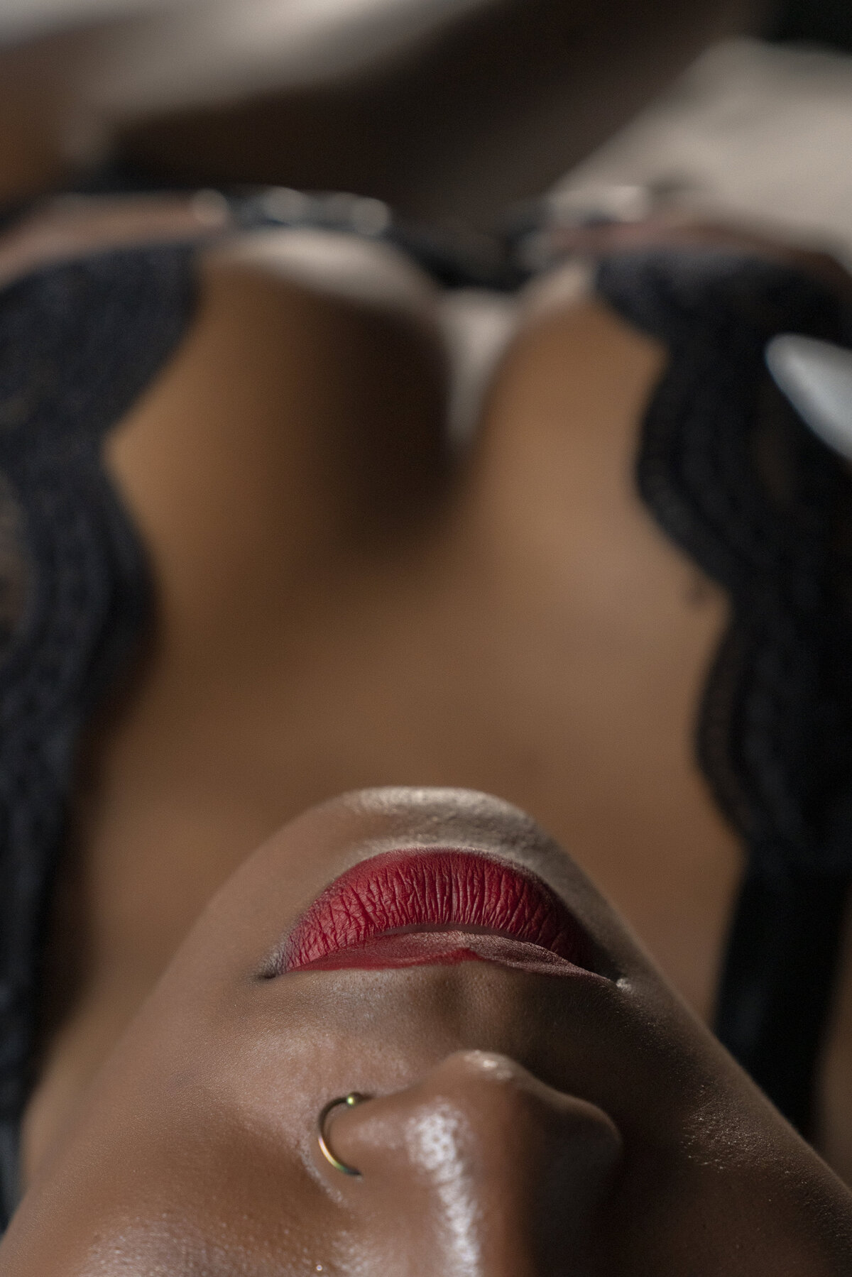 close up image of woman's lips and cleveage