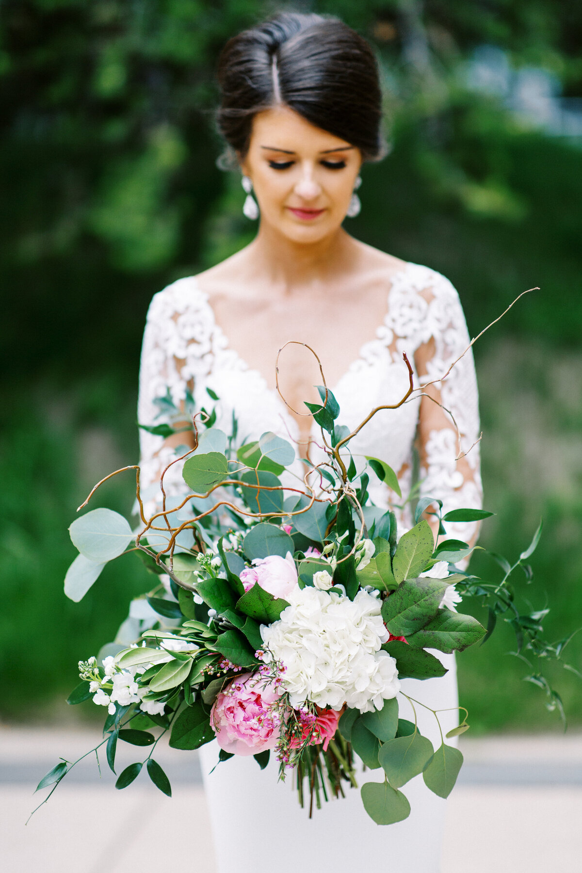 Minnesota bride showing her bouquet