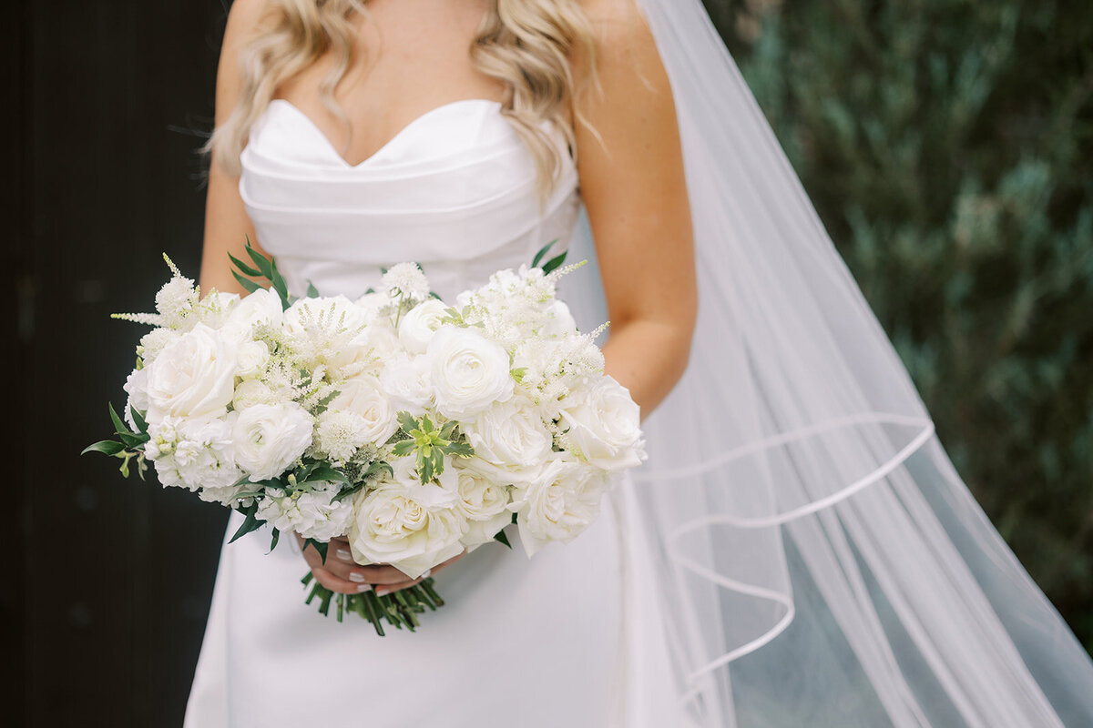 White and green flowers for a wedding at The Palm Event Center wedding flowers by The Flower House in Livermore, California.