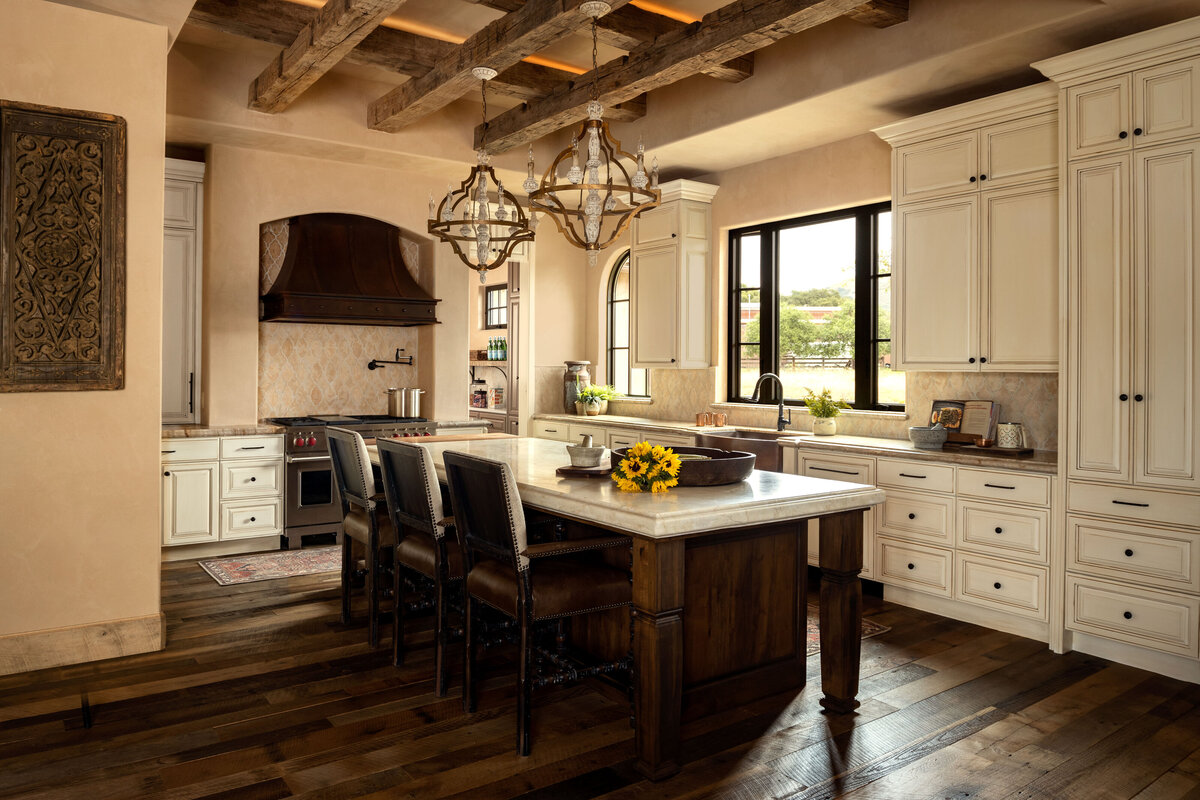 Interior photography of a rustic kitchen with wooden beams and farmhouse-style decor