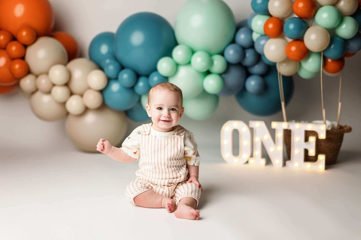 NW Arkansas cake smash photographer, cake smash photography near me, baby birthday photoshoot NW Arkansas