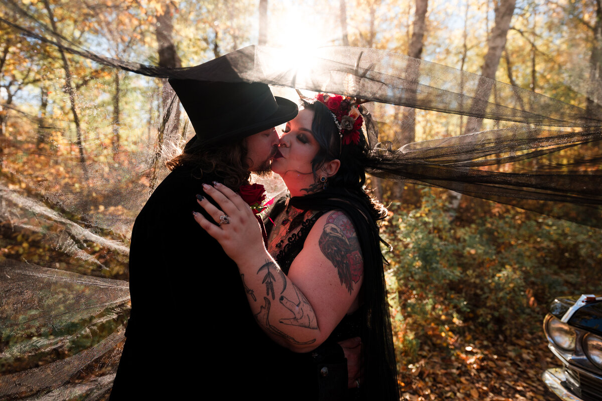 black veil photos showcasing a gothic bride and groom