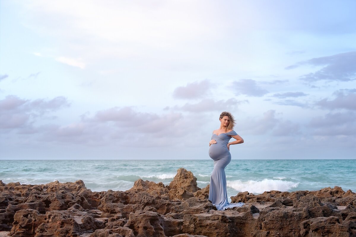 beach sunrise pregnancy photo in blue dress