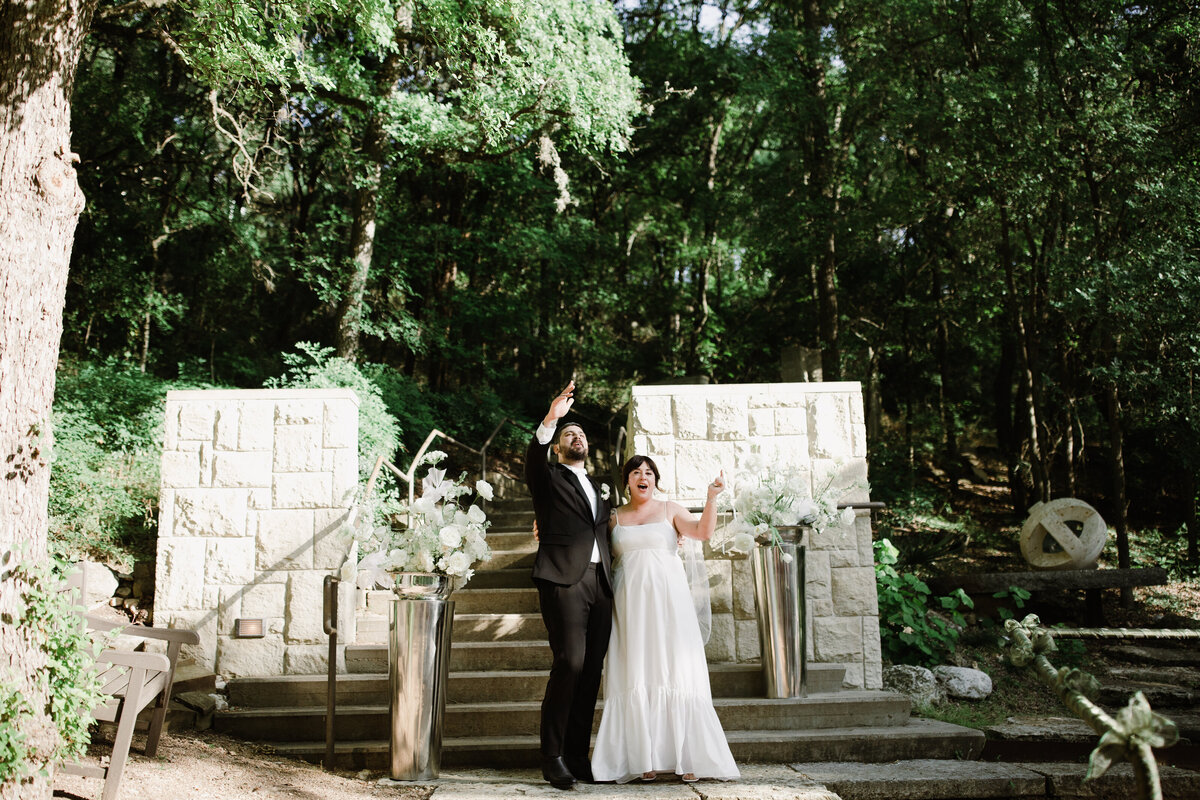 Bride and groom just married at Umlauf Sculpture Garden, Austin