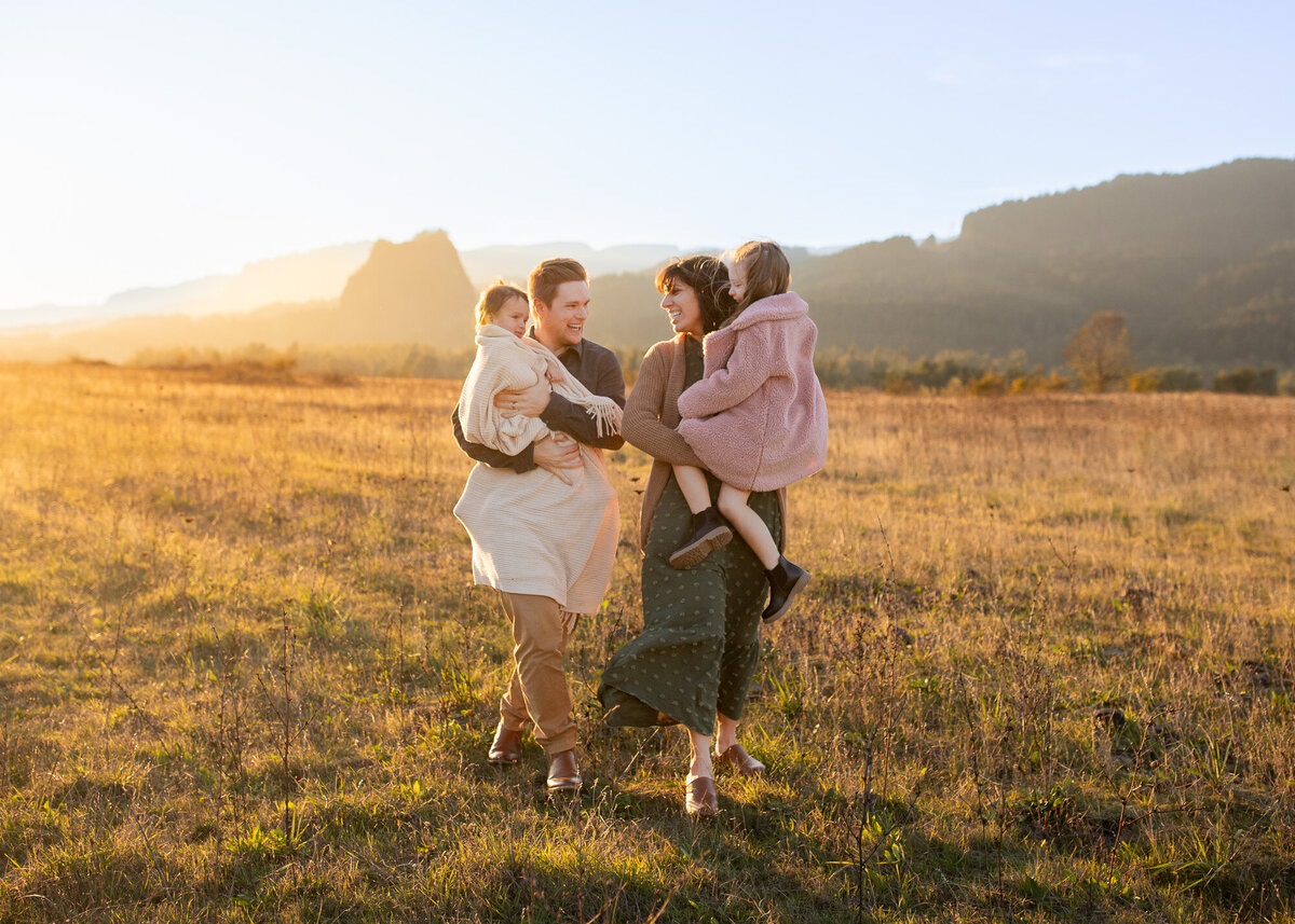 Family walking in front of Beacon Rock , image by Family Photographer in Vancouver