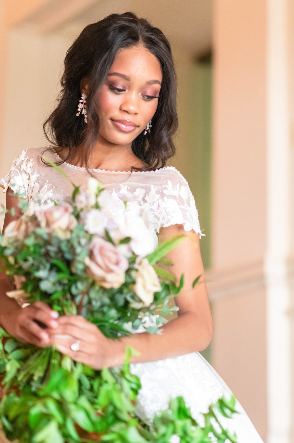 African American bride holding bouquet