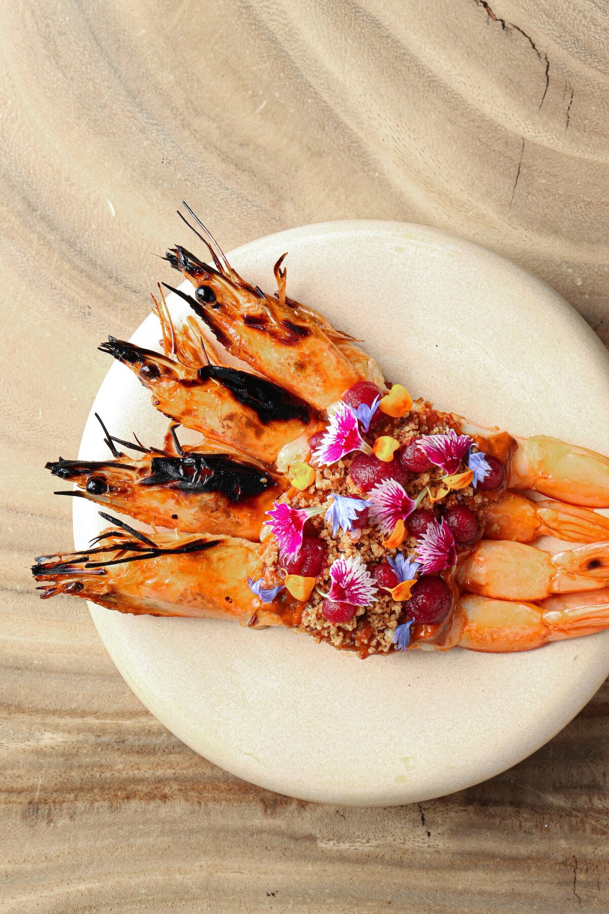 a plate of seared shrimp