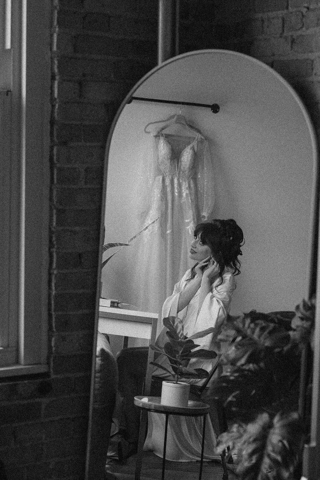 Candid bridal prep moment before wedding ceremony in Battle Creek Michigan