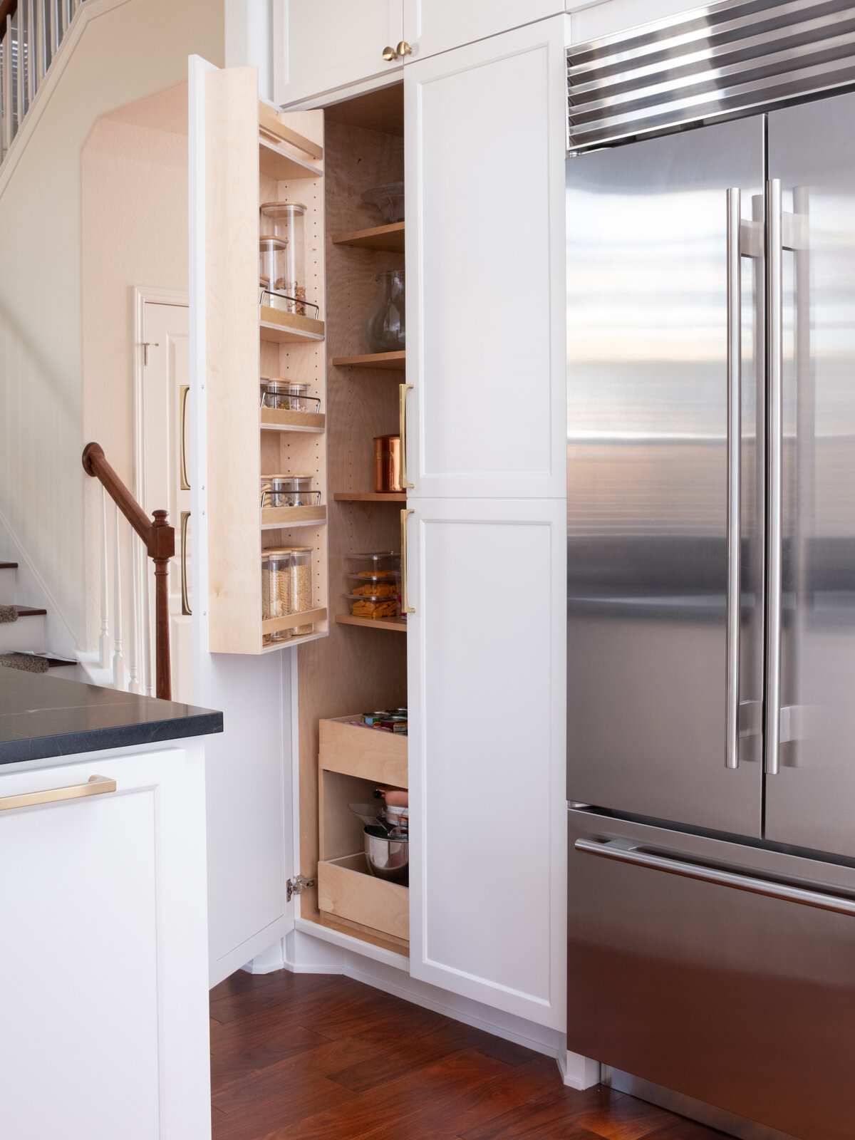 hello-home-austin-cream-kitchen-remodel-zellige-backsplash-contemporary-kitchen-subzero-refrigerator-pantry-door-storage- soapstone-countertop-8