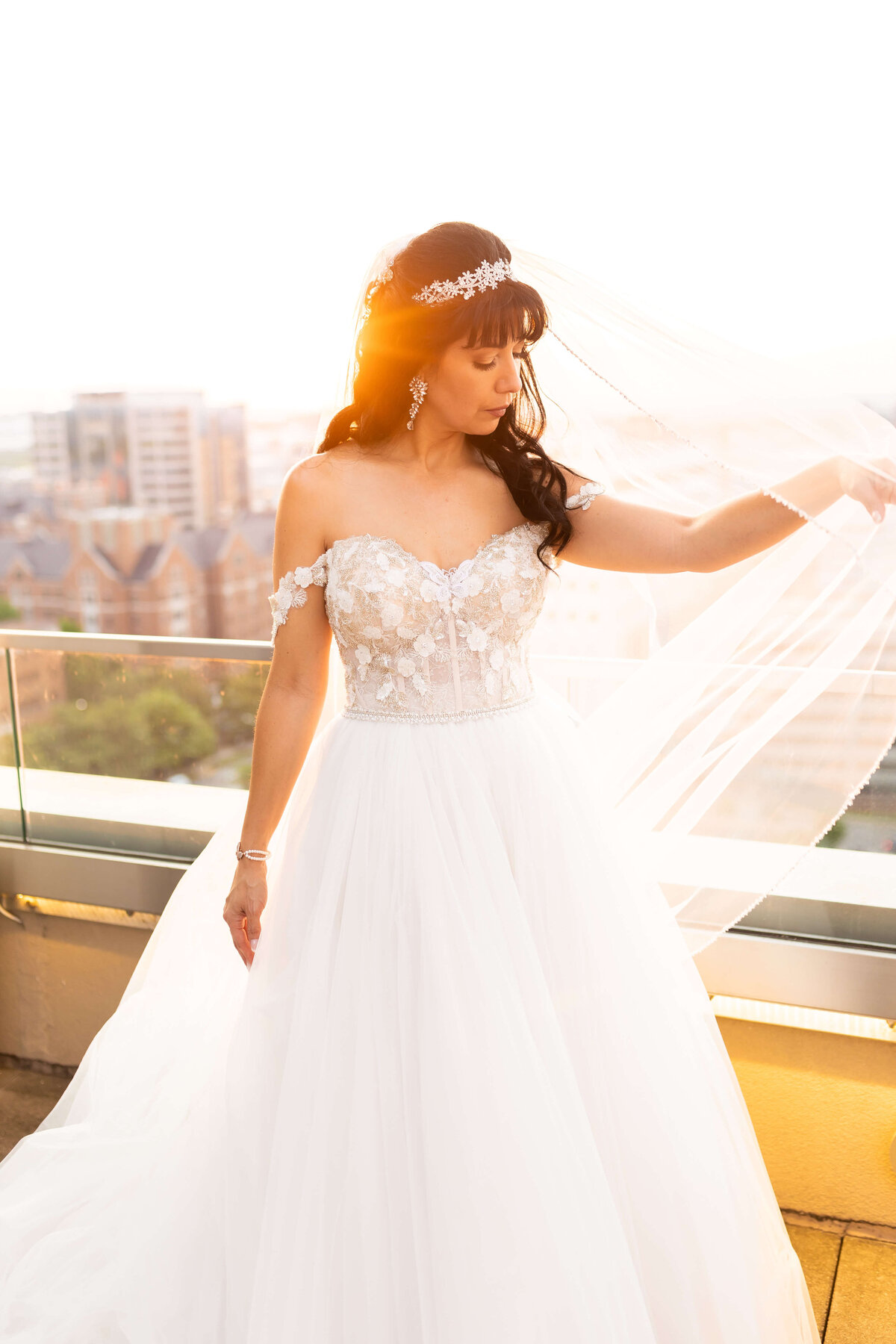 Bride holding veil up at The Aertson hotel, Nashville