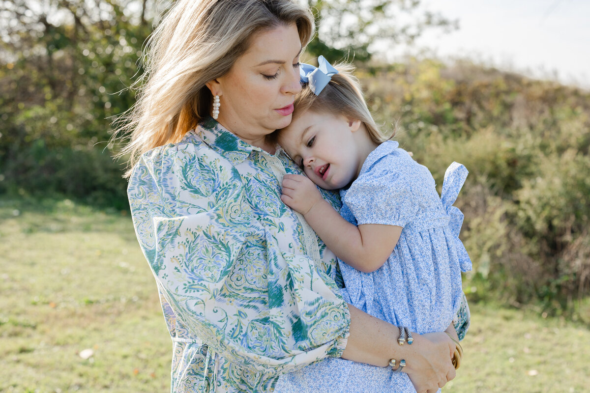 mom holding her daughter at Chattanooga family session