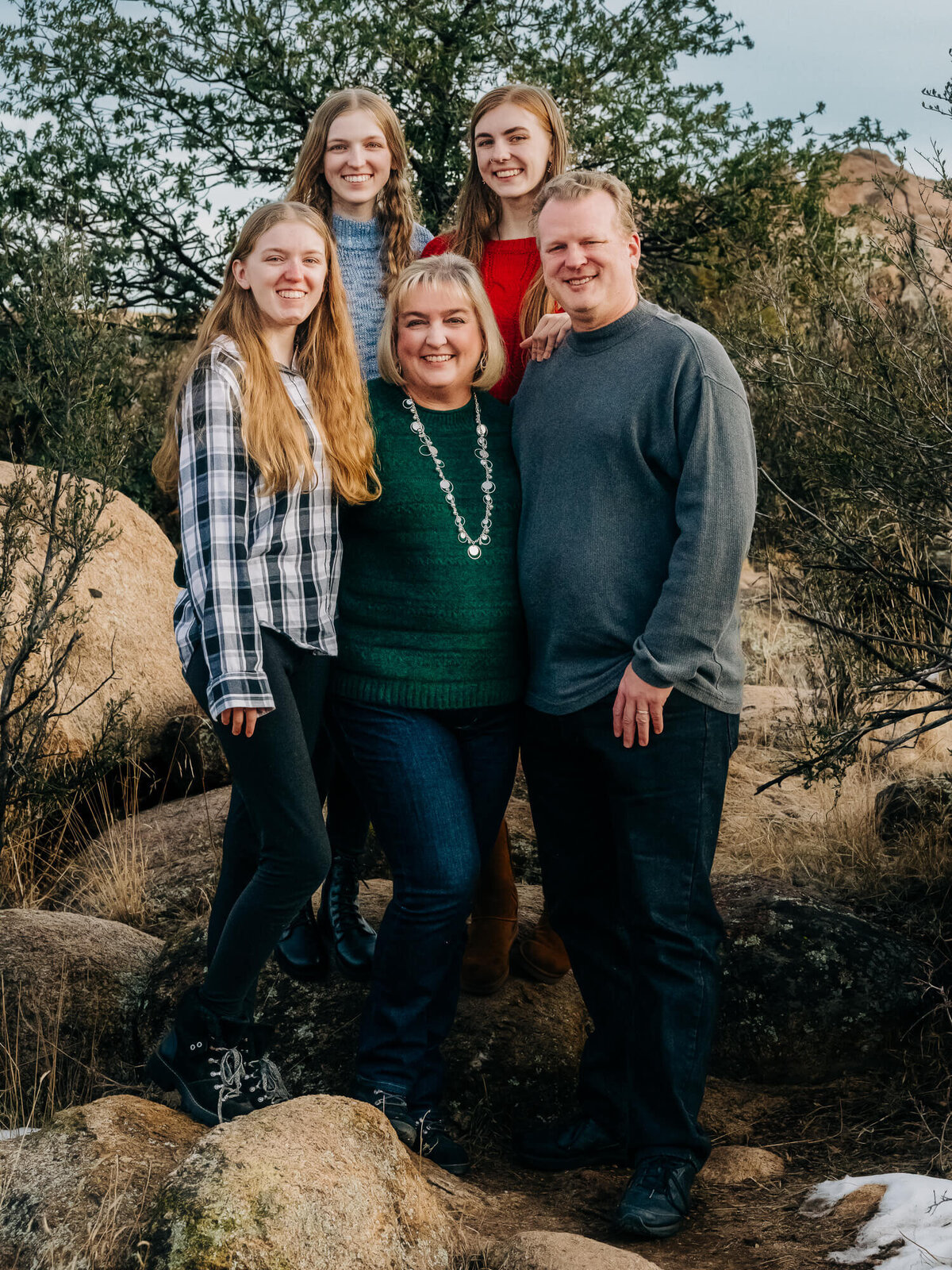 Parents and daughters pose in Granite Dells in Prescott family photography session