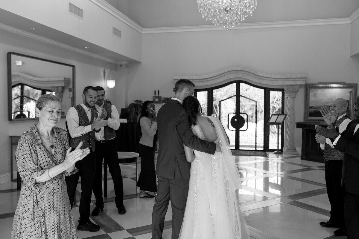 Bride and groom embracing taken by Shelby Ann Photos, film wedding photographer