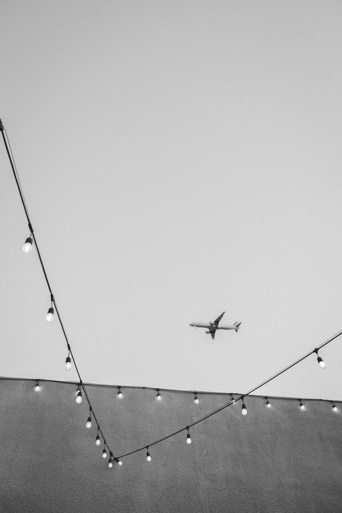 Airplane passing overhead of the venue The Croft downtown wedding 