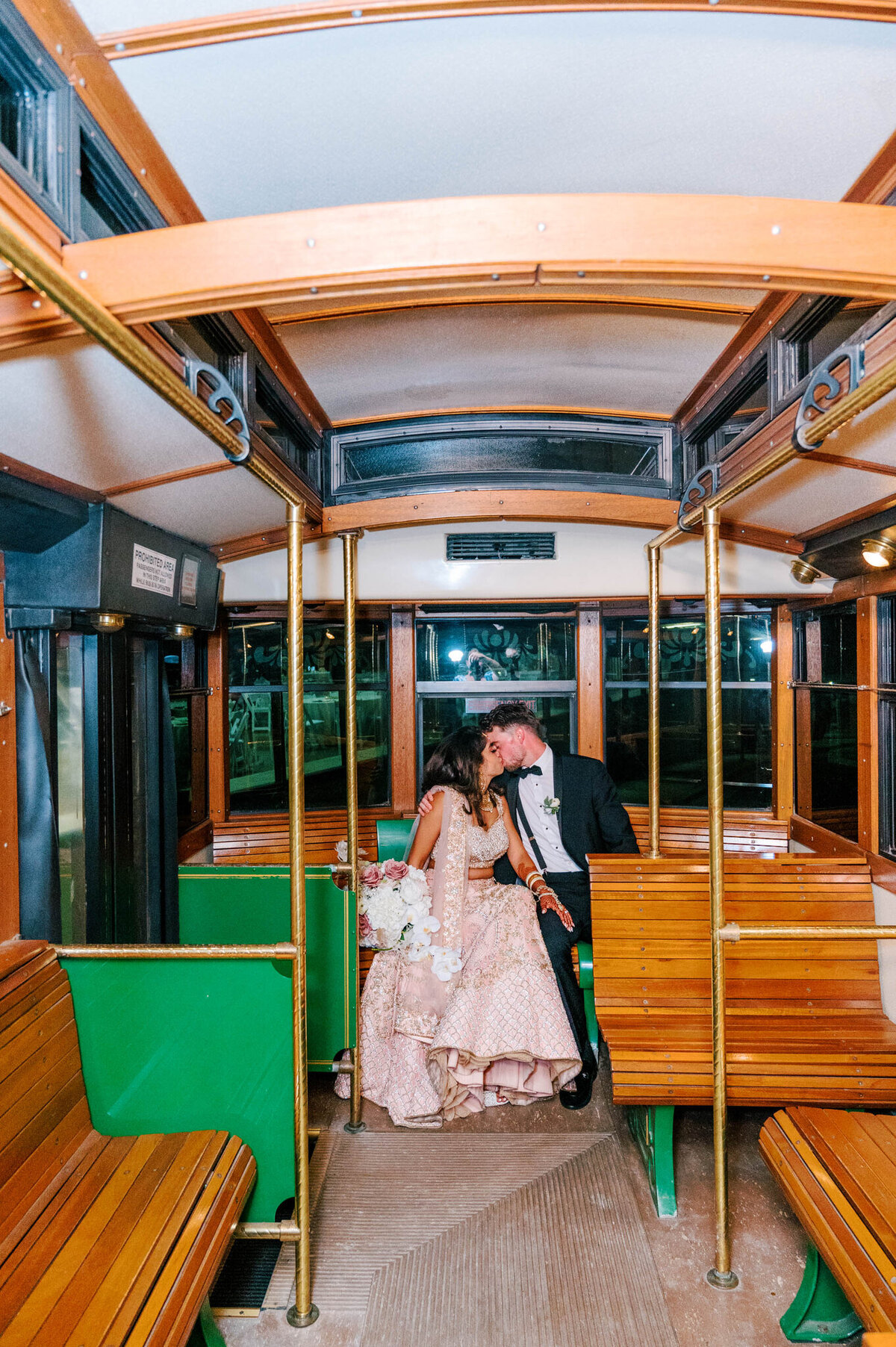 Shaoleen & Collin Reception event 7 grand exit leaving on the Great Raleigh Trolly 2