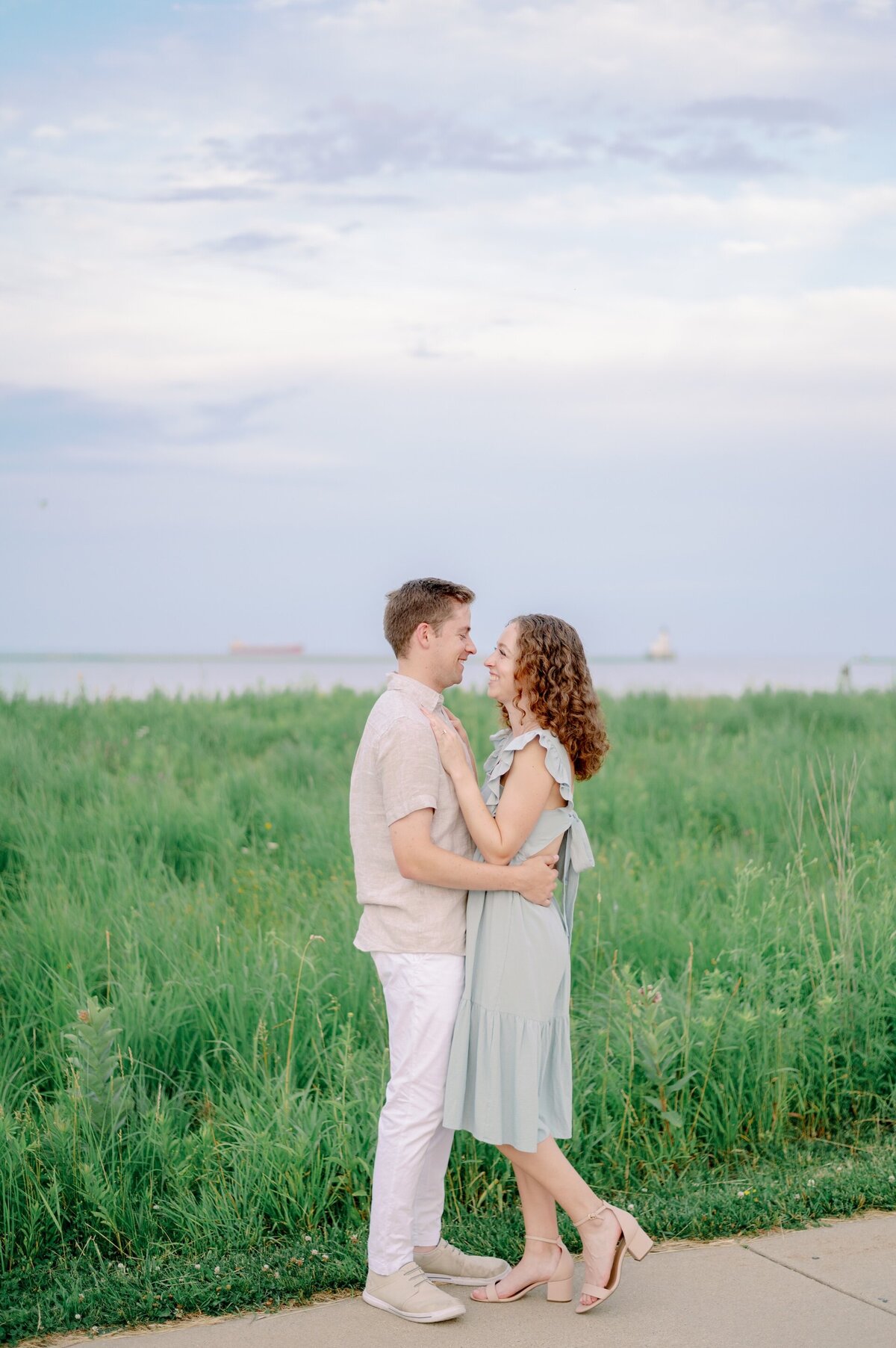 couple looking lovingly into each other's eyes while surrounded by nature