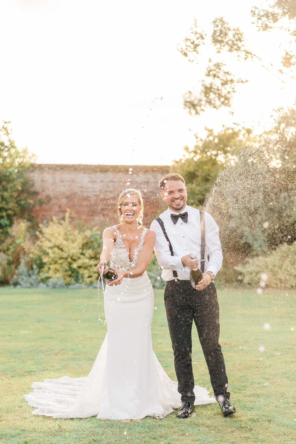 Champagne spray by a. light Cheshire wedding photographer