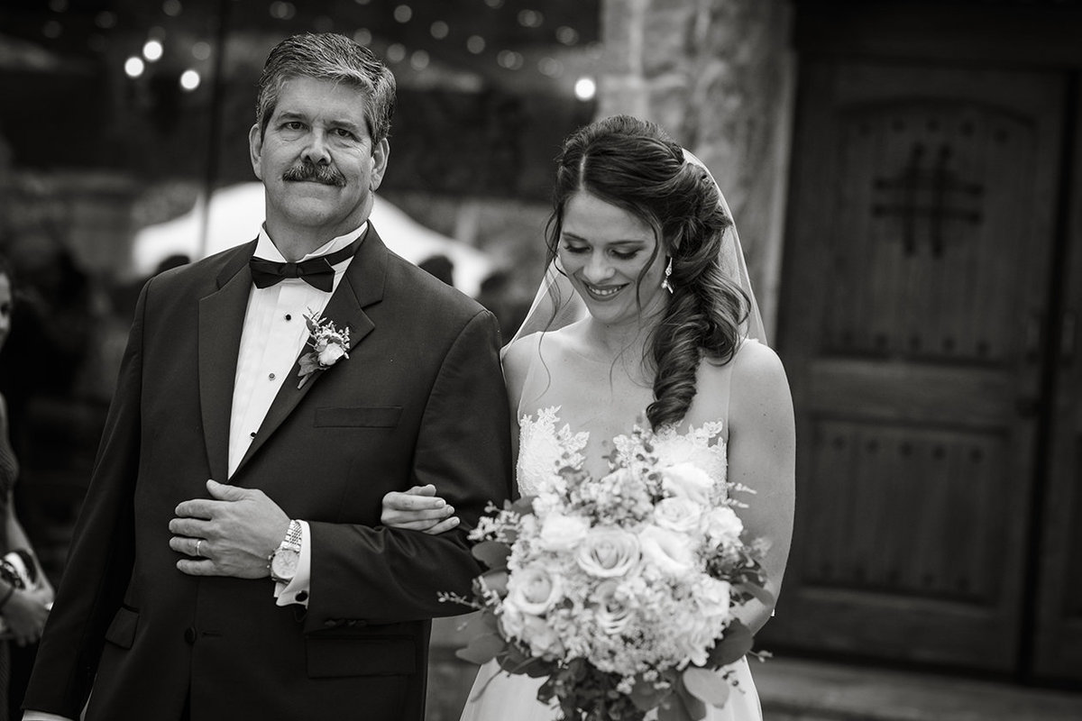 Bride and Father walk down the aisle