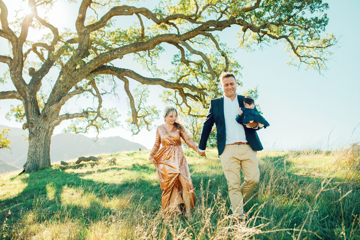 Family Portrait Photo Of Couple Holding Hands While Walking Los Angeles