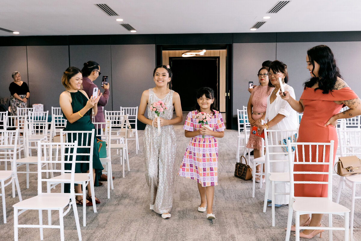 Cbildren walking down the aisle at the Brisbane Registry Office