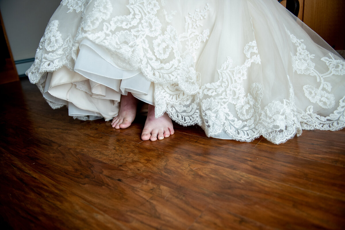 Feet in white dress