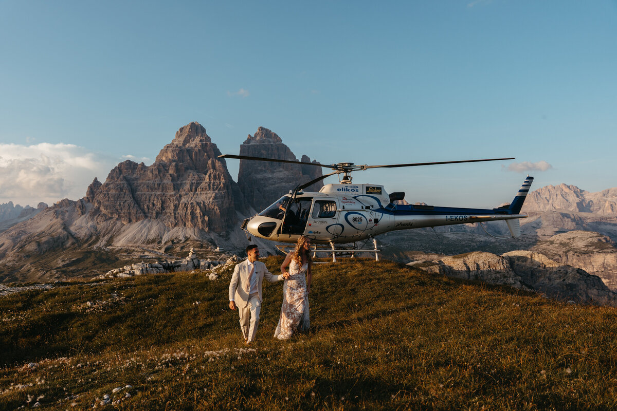 Couple with Elikos Helicopters having elopement on Cadini di Misurina